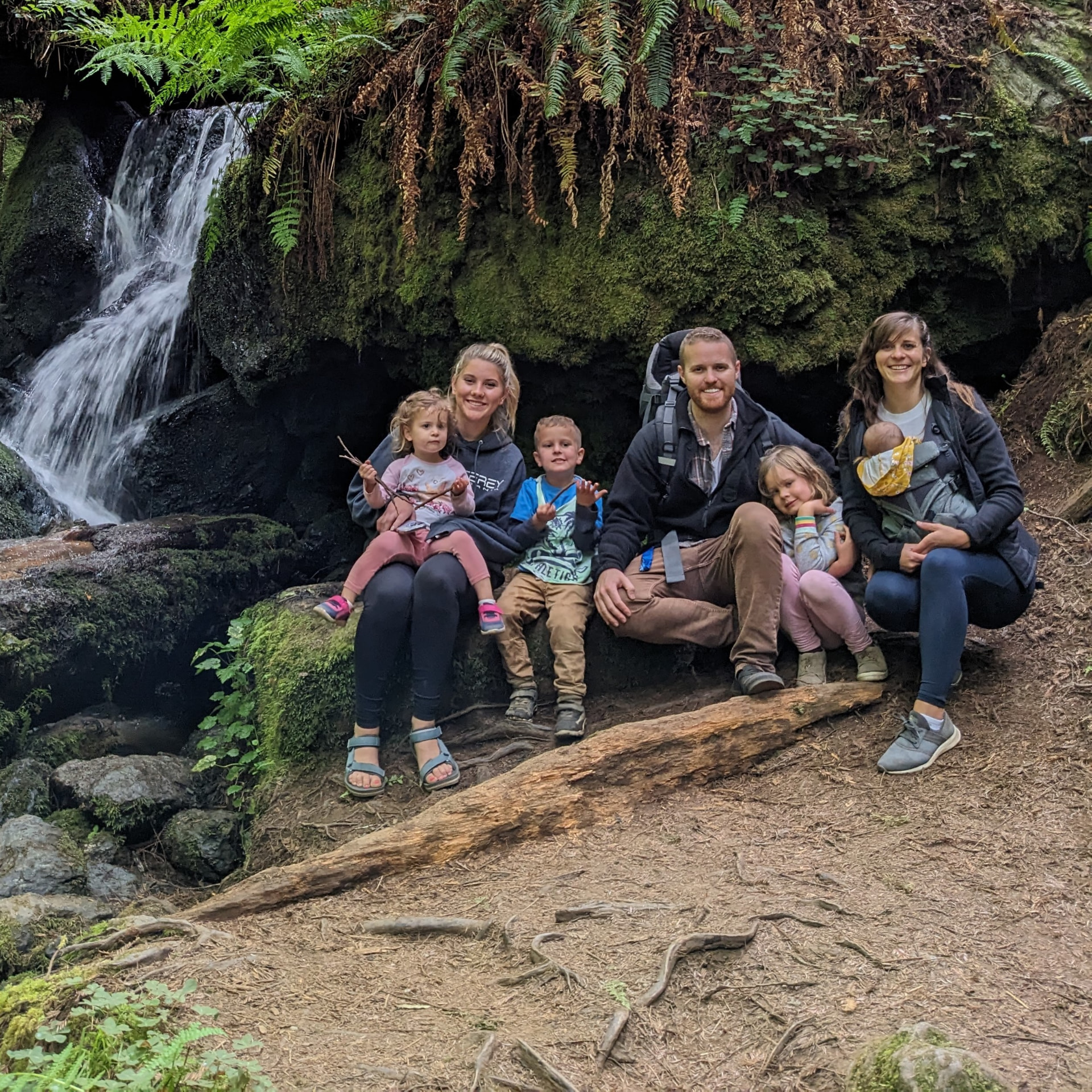 Family at a waterfall